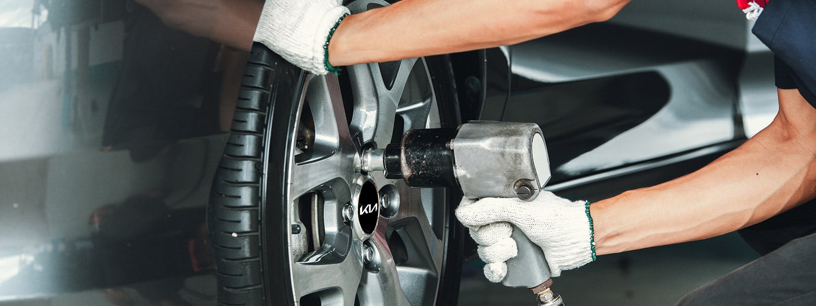 A wheel being torqued on a Kia in the Scarboro Kia service department