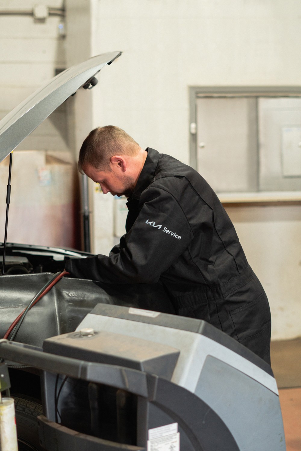 EV-certified service technician at Scarboro Kia in Scarborough, Ontario