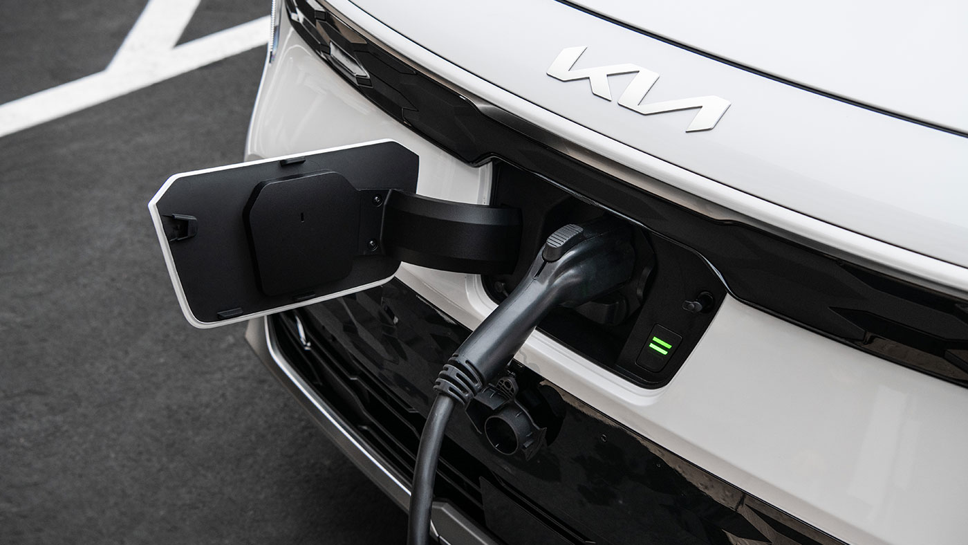 2025 Kia Niro EV charging using front-mounted charger